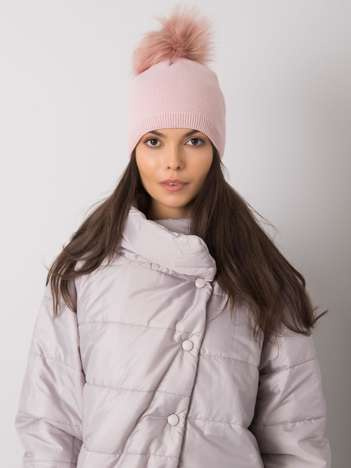 Helle rosa gefütterte Damenmütze mit Pompon.