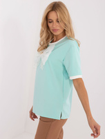 Hurtownia Miętowa elegancka bluzka z kokardą