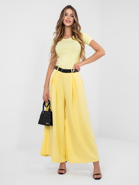Pastelowe żółte spodnie z szeroką nogawką RUE PARIS