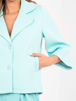 Miętowy krótki płaszcz z piankowego materiału 