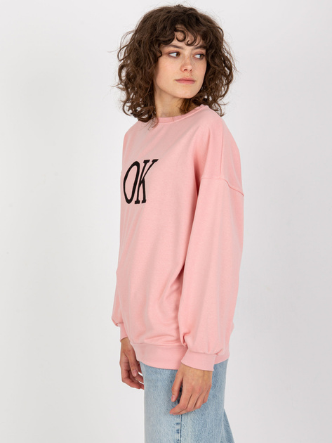 Hurtownia Jasnoróżowa luźna bluza bez kaptura z napisem