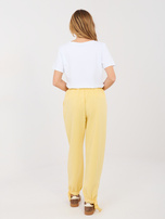 Jasnożółte dresowe spodnie z kieszeniami