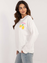 Hurtownia Ecru damska bluzka oversize z nadrukiem