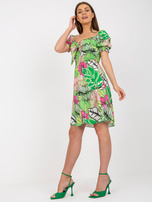 Zielona sukienka z printami i wiązaniem przy dekolcie