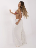 Jasnobeżowe spodnie palazzo bez zapięcia