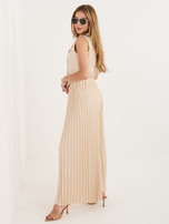 Beżowy damski garnitur z szerokimi spodniami