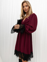 Burgundy dress with puff sleeves.