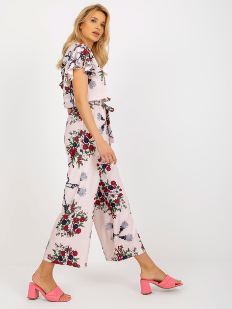 Hurt Jasnoróżowy kombinezon w kwiaty z szerokimi spodniami