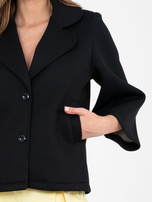 Black foam coat with pockets.