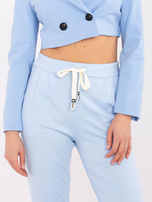 Hurtownia Jasnoniebieskie dresowe spodnie typu bryczesy