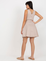 Hurt Beżowa rozkloszowana sukienka jeansowa z guzikami