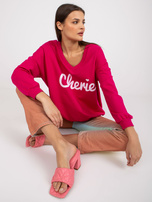 Fuchsia-weiße lockere Sweatshirt mit Druck und langen Ärmeln.