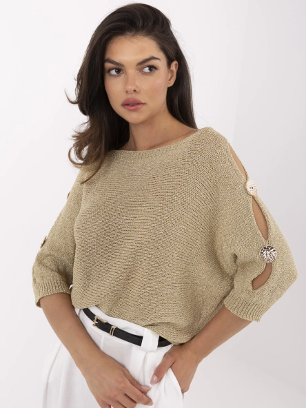 Goldener Fledermaus-Pullover mit metallischem Faden.