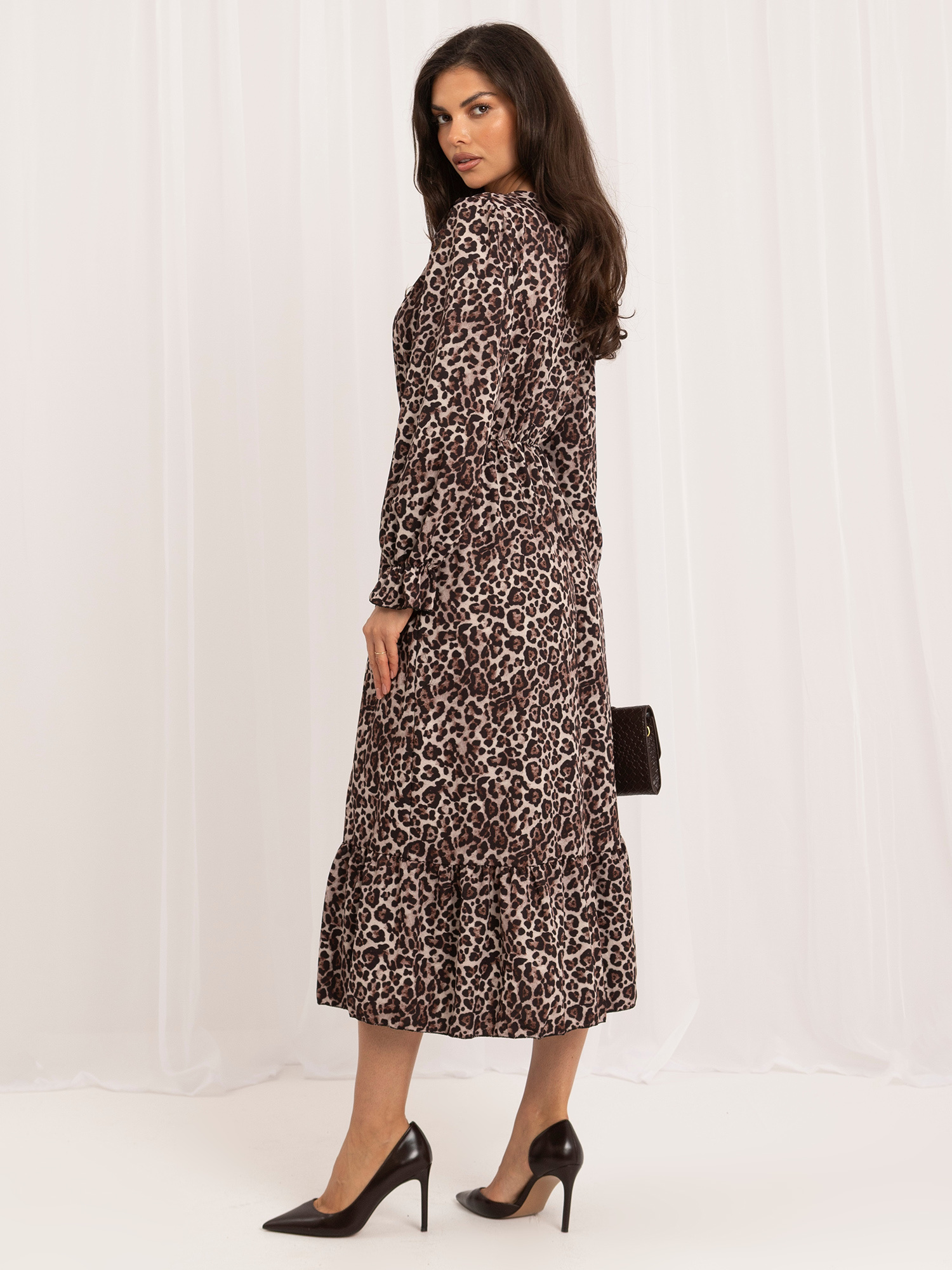 Black-beige midi dress with a slit.