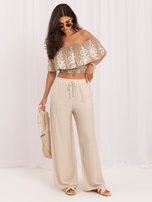 Light beige wide trousers made of viscose.