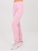 Jasnoróżowe dresowe spodnie ze ściągaczami RUE PARIS 