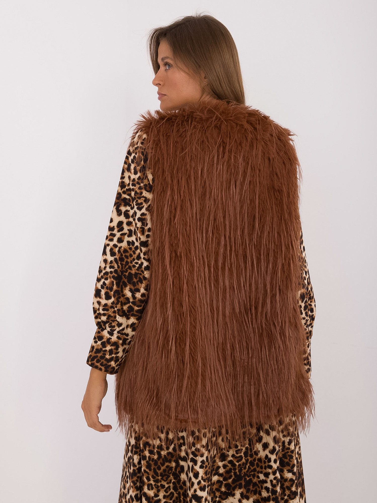 Hurt Light brown fur vest with lining.