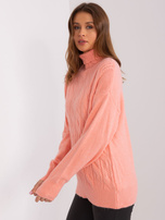 Hurt Brzoskwiniowy damski golf z warkoczami