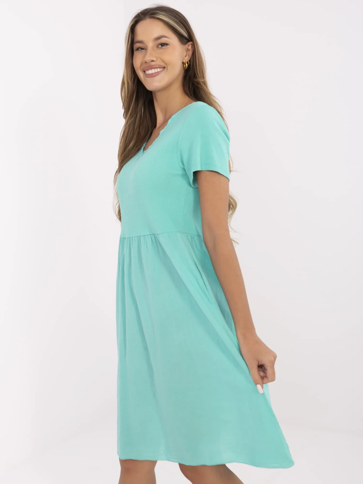 Türkise Sommerkleid mit Taschen.
