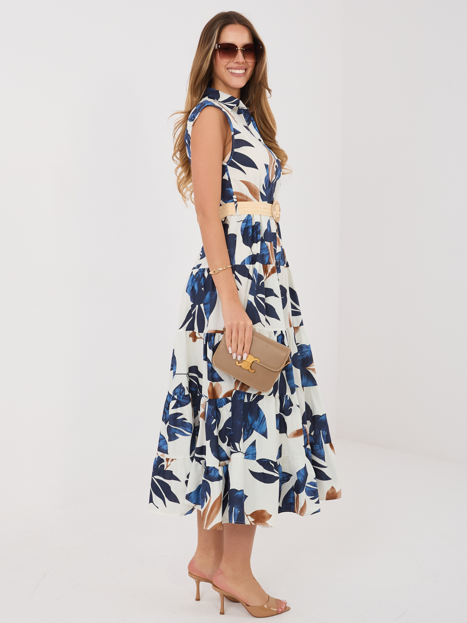 Navy blue shirt dress with a floral pattern.
