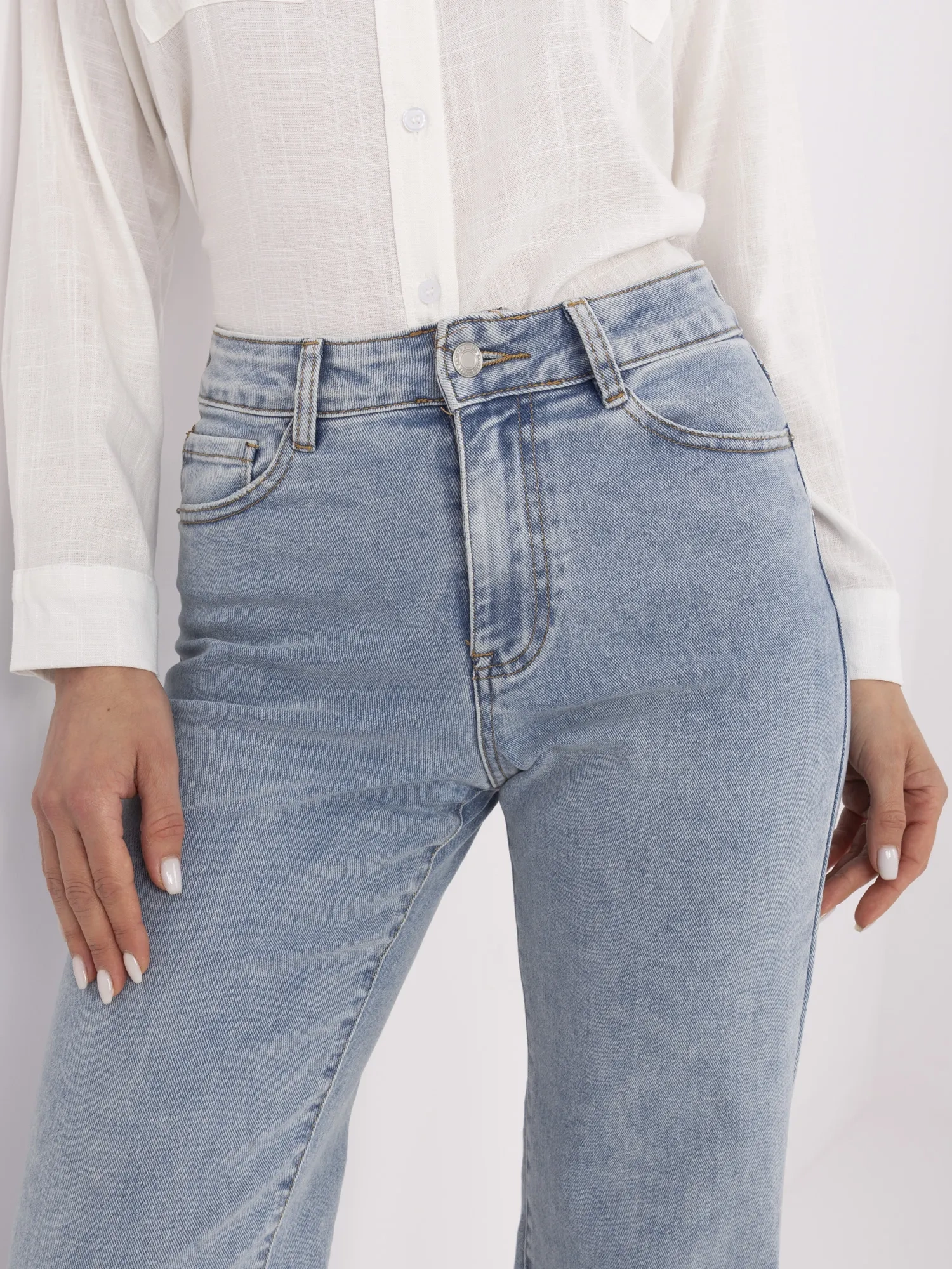 Blue long jeans with wide legs.