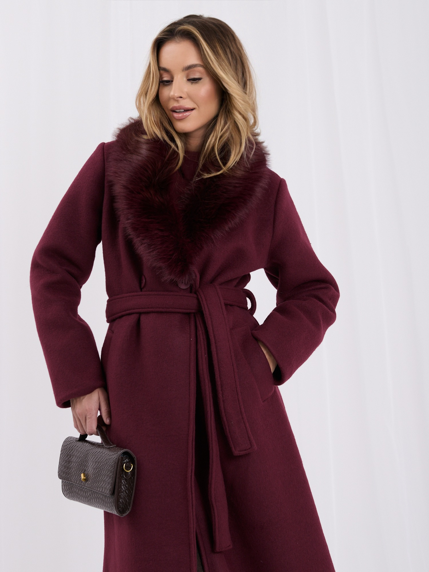 Burgundy double-breasted coat with fur.
