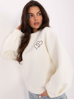 Ecru sweatshirt with embroidery.
