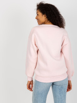 Hurt Jasnoróżowa dresowa bluza oversize z nadrukiem  