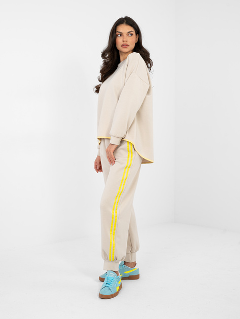 Jasnobeżowe spodnie z kontrastowymi lampasami RUE PARIS