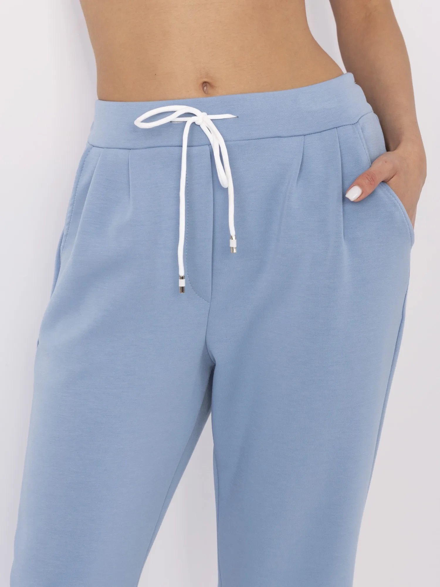 Blue trousers made of pleasant-to-touch material.