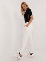 Ecru ocieplane spodnie dresowe ze ściągaczem