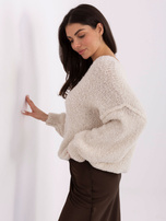 Světlobéžový dámský svetr boucle s prošíváním.