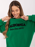 Hurtownia Ciemnozielona luźna bluza bez kaptura z napisami  