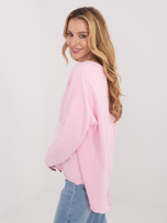 Jasnoróżowa bluza z ozdobnym przeszyciem