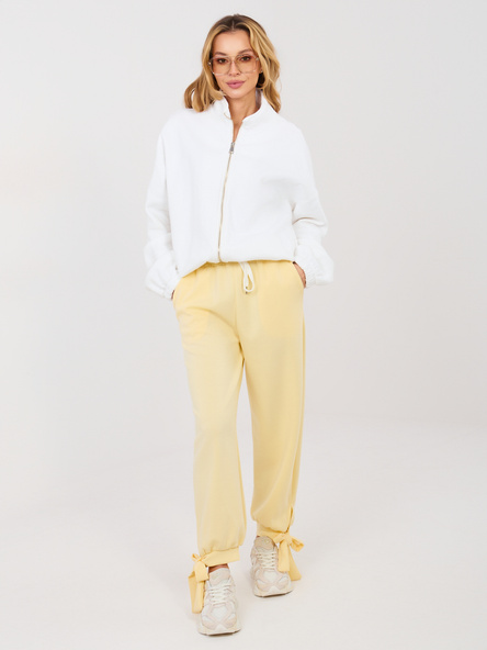 Jasnożółte dresowe spodnie z kieszeniami
