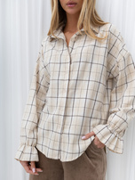 Světlobéžová rozepínací košile na kostky.