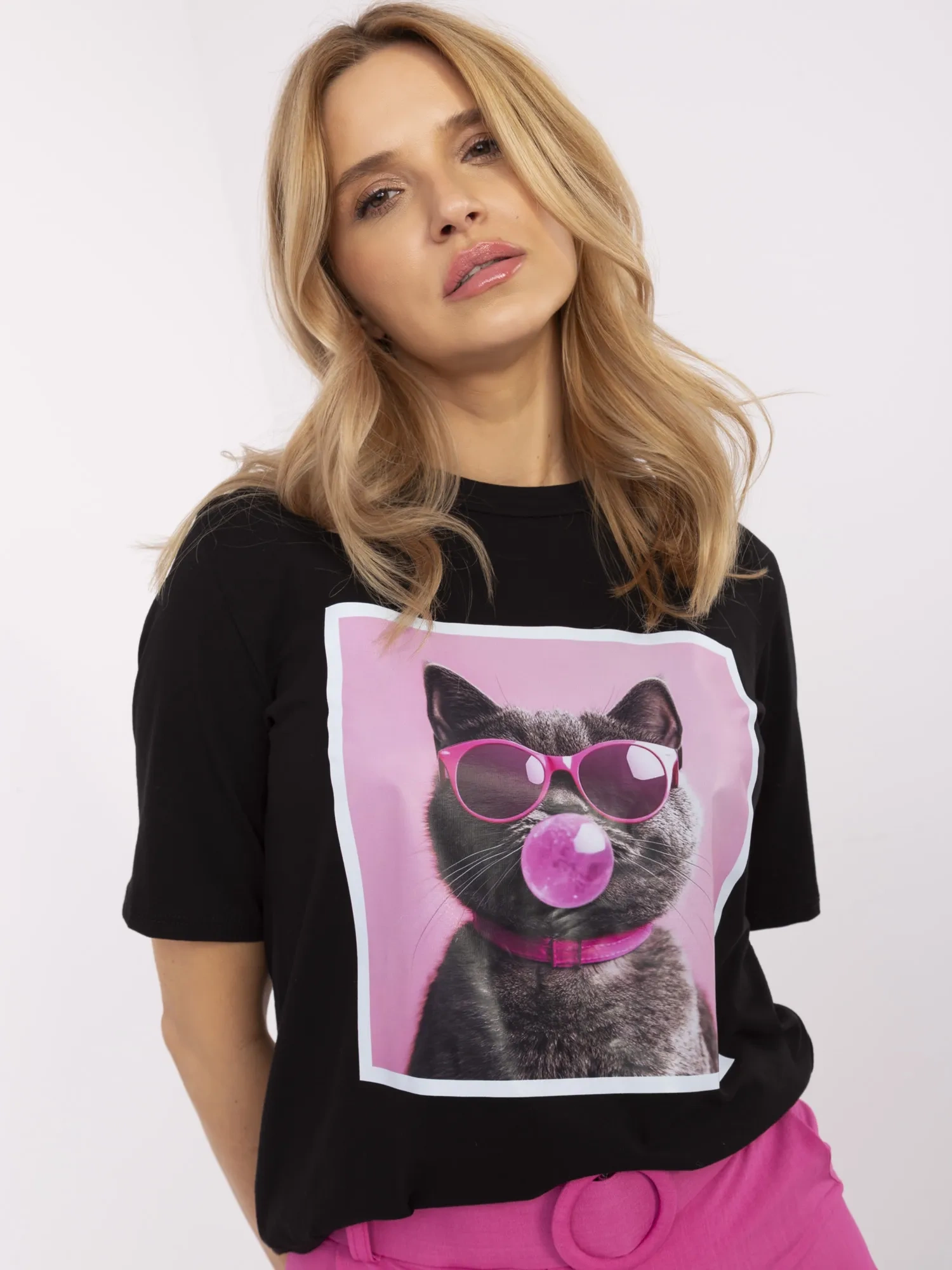 Black women's t-shirt with a cat print.