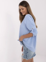 Light blue muslin women's cotton shirt.