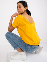 Jasnopomarańczowa bluzka z dekoltem na plecach Salma RUE PARIS