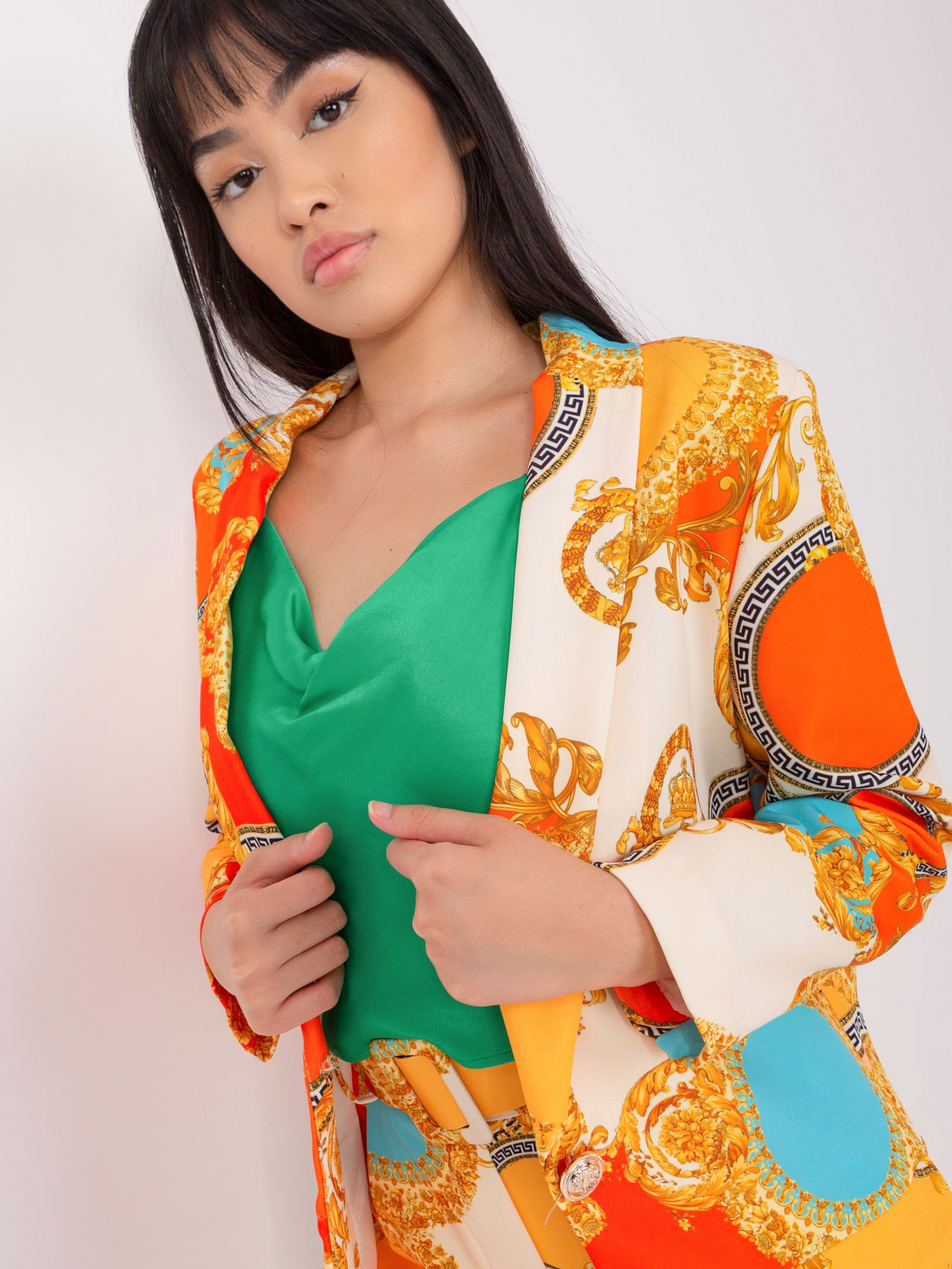 Hurt orange-dunkelgelbe Anzugjacke.