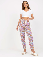 Biało-fioletowe letnie spodnie z materiału we wzory SUBLEVEL