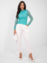 Turkusowa bluzka z marszczonymi rękawami 