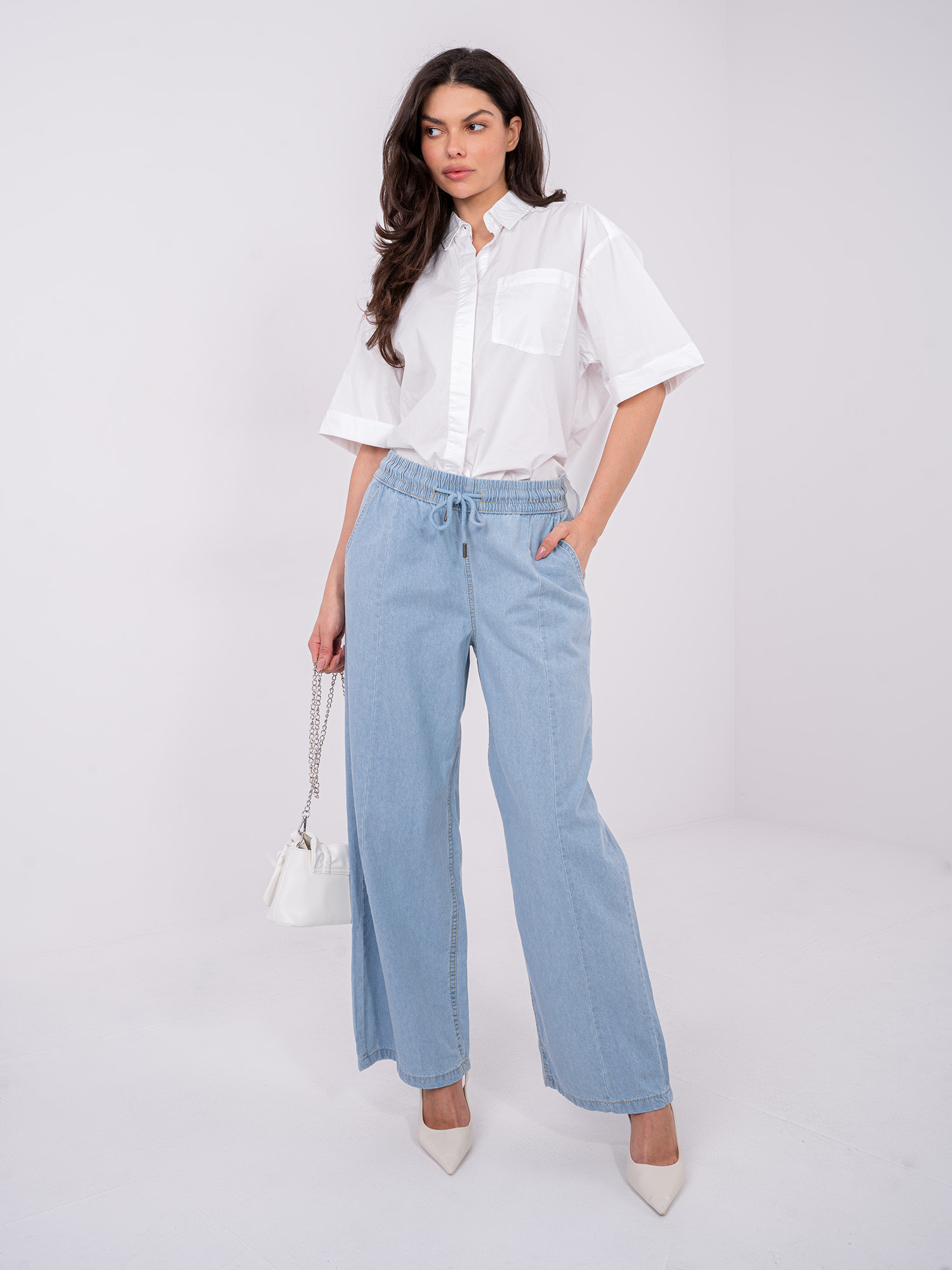 Light blue wide leg jeans with stitching SUBLEVEL.