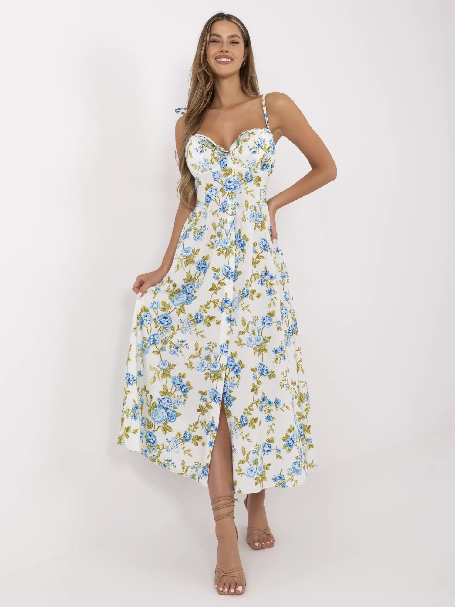 White flared dress with flowers.