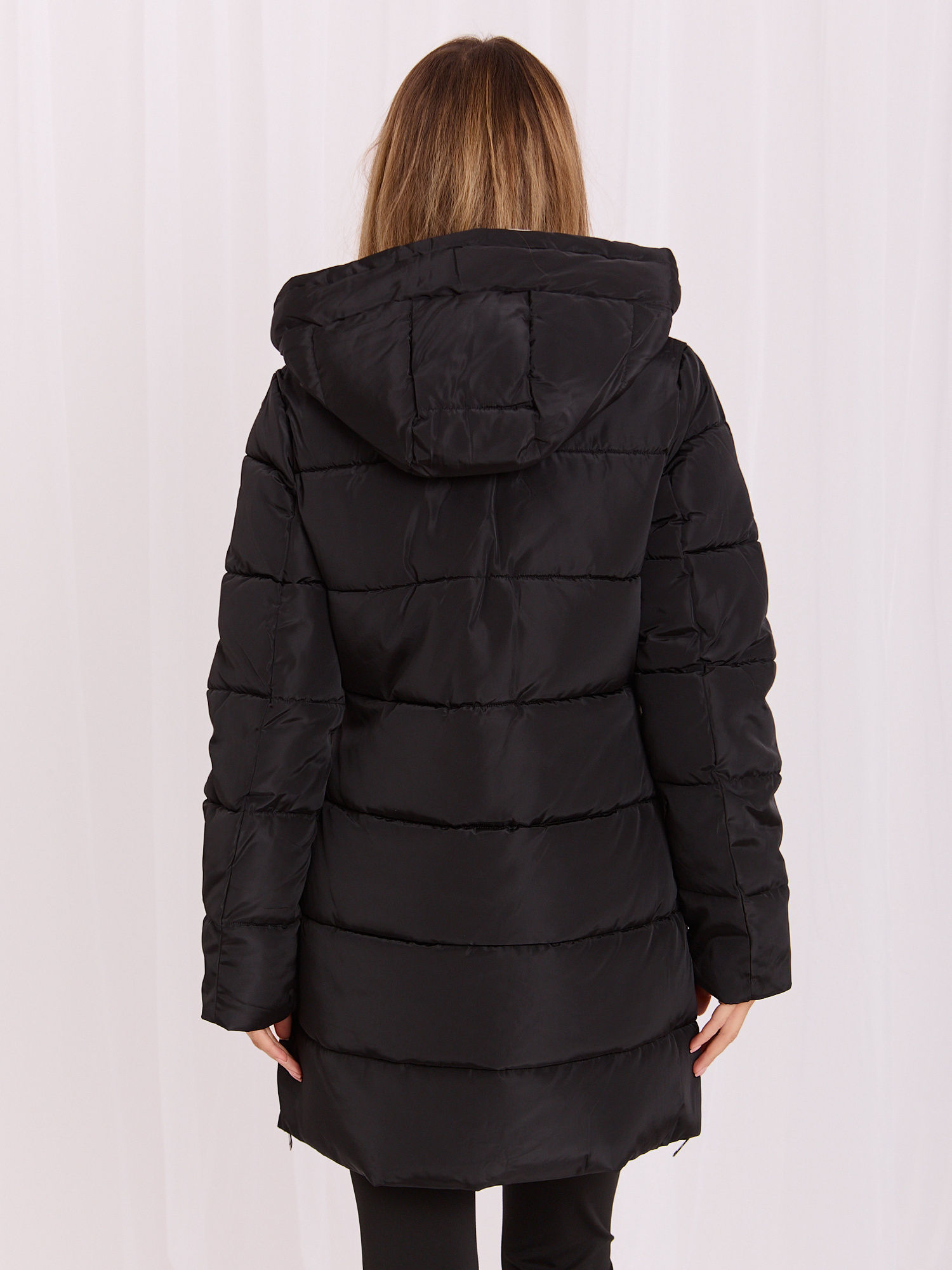 Hurt schwarz-beige wendbare Winterjacke mit Kapuze.