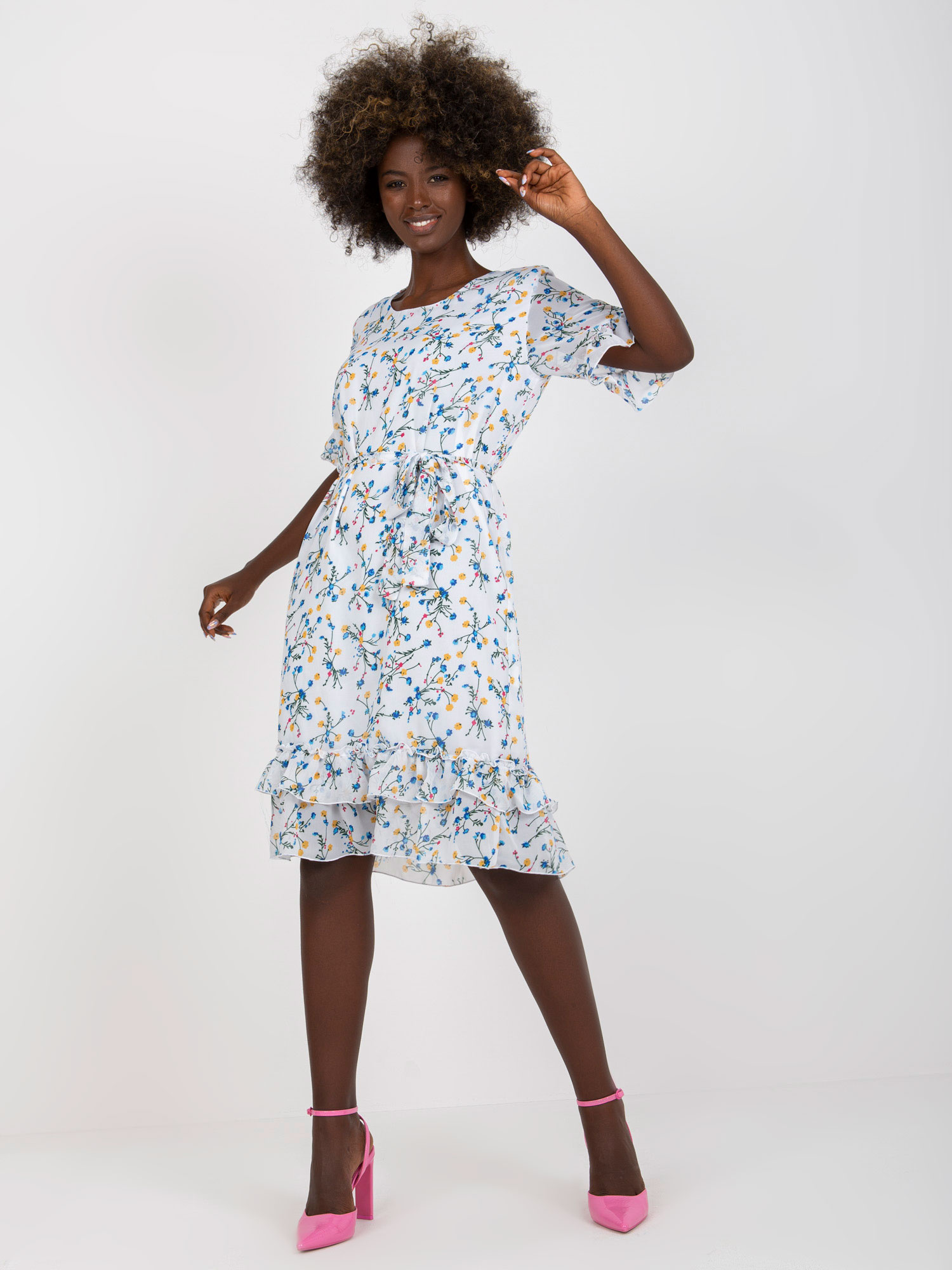 White midi dress with floral pattern and flounces