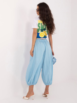 Jasnoniebieskie sztruksowe spodnie bez zapięcia
