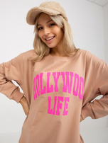 Hurtownia Beżowo-różowa długa bluza oversize z napisem