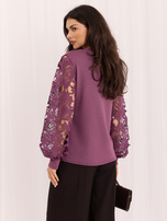 Purple elegant blouse with puff sleeves.