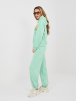 Pastelowy zielony dresowy komplet z nadrukiem RUE PARIS 